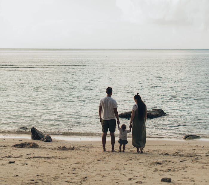 Woman and Man Standing at Shores